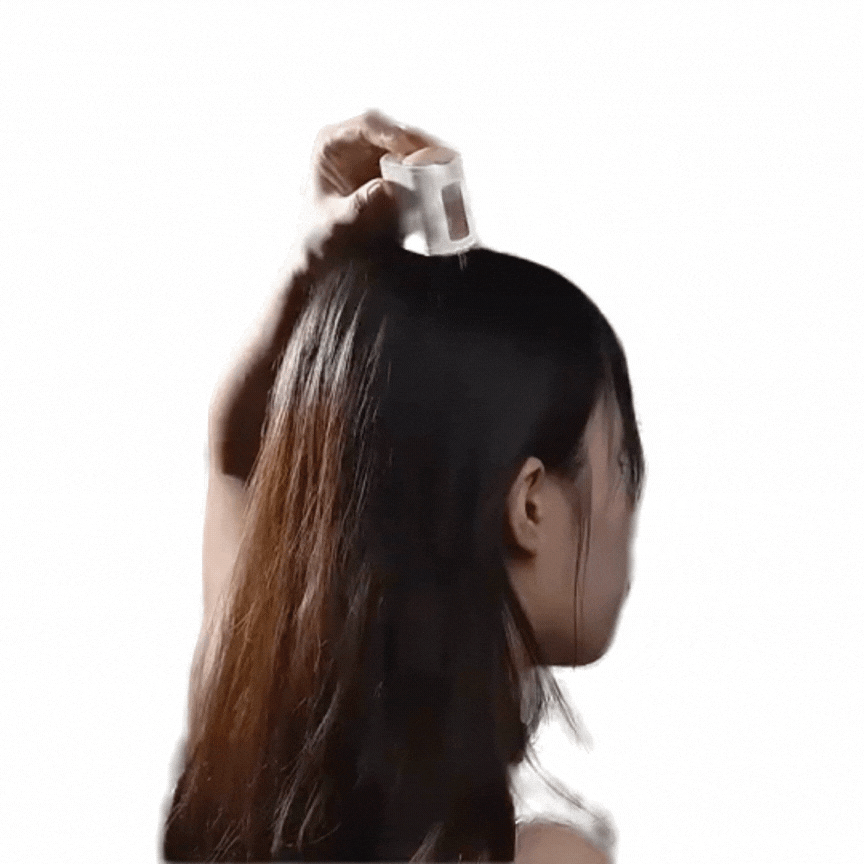 Päänahan hierontalaite, joka tehostaa hiusten kasvua ja parantaa verenkiertoa pään alueella.